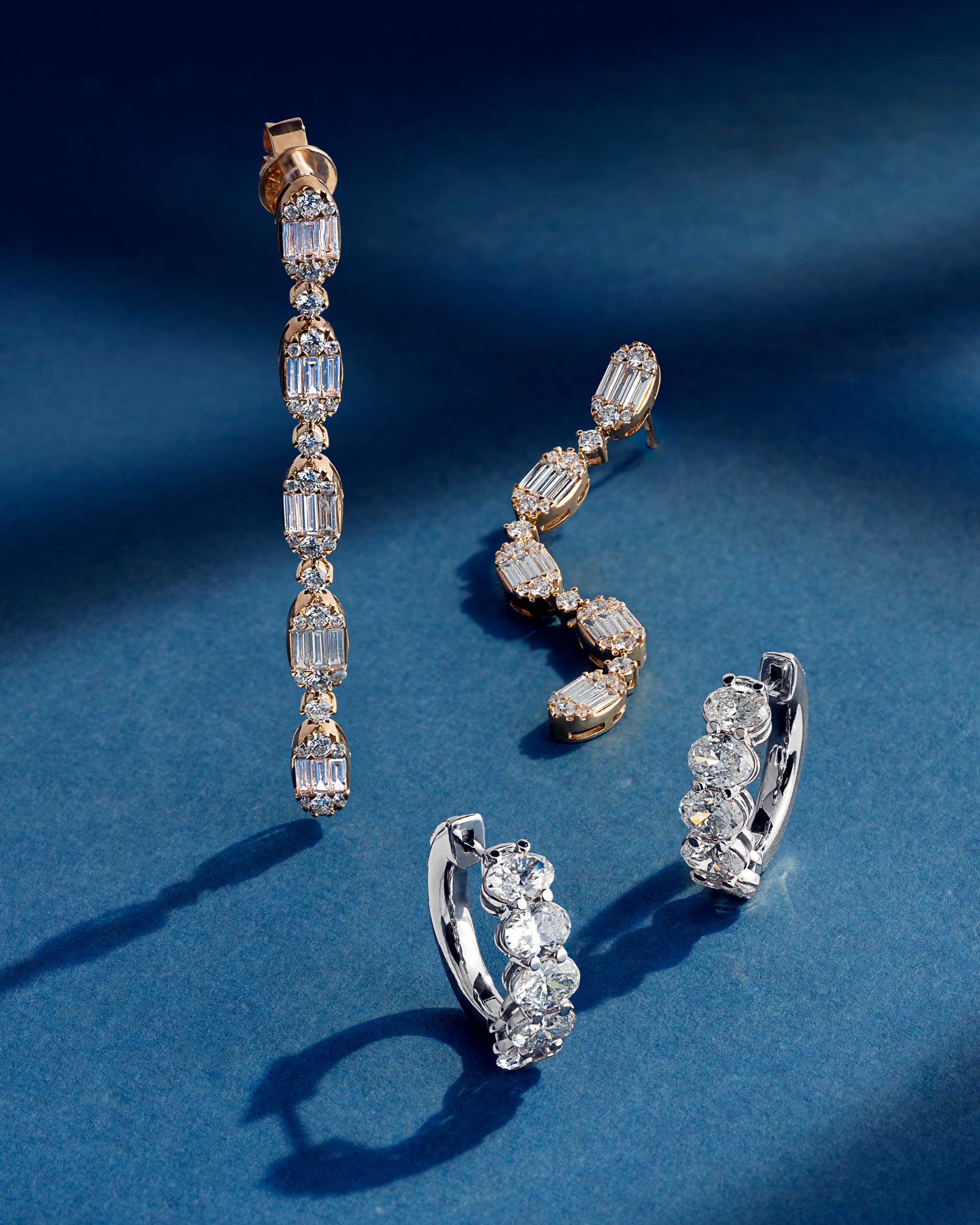 Collection of elegant earrings in various styles and designs